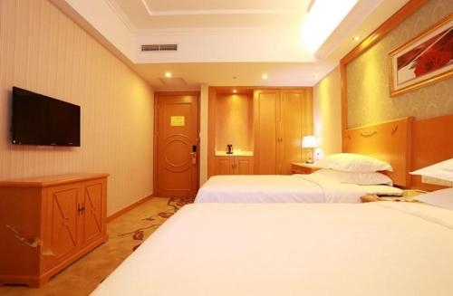 Imagen de la habitación del Hotel Vienna Tianjin Huanghe Road. Foto 7