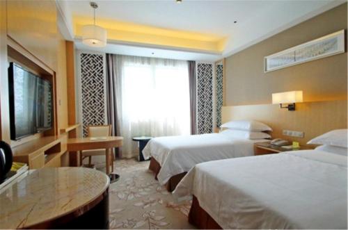 Imagen de la habitación del Hotel Vienna Waigaoqiao. Foto 5