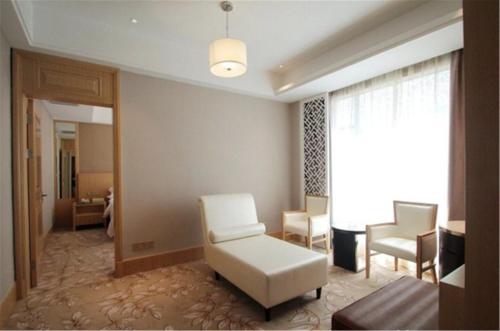 Imagen de la habitación del Hotel Vienna Waigaoqiao. Foto 8