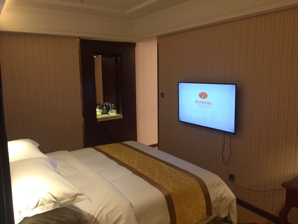Imagen de la habitación del Hotel Vienna Wanda Square. Foto 2