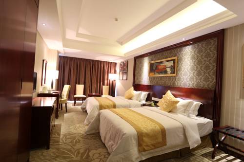 Imagen de la habitación del Hotel Vienna Xinyu Kaiguang. Foto 5