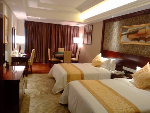 Imagen de la habitación del Hotel Vienna Xinyu Kaiguang. Foto 7