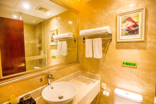 Imagen de la habitación del Hotel Vienna Xinyu Kaiguang. Foto 8