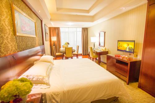 Imagen de la habitación del Hotel Vienna Xinyu Kaiguang. Foto 9