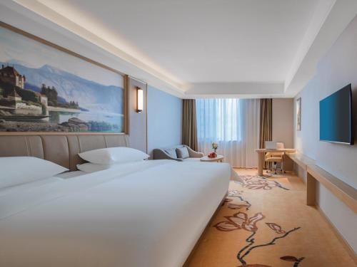 Imagen general del Hotel Vienna Yangzhou Gaoyou Dongfangyujing. Foto 1