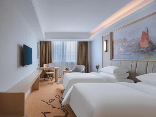 Imagen de la habitación del Hotel Vienna Yangzhou Gaoyou Dongfangyujing. Foto 8