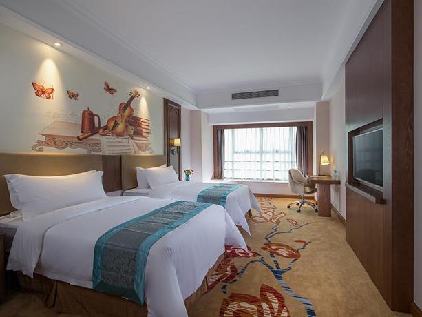 Imagen de la habitación del Hotel ViennaInternational Hotel Luogang Wanda Plaza. Foto 9