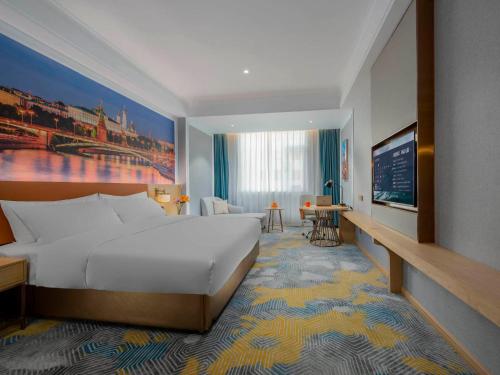 Imagen de la habitación del Hotel Viennas Yuncheng Hedong Street Wanda Store. Foto 16