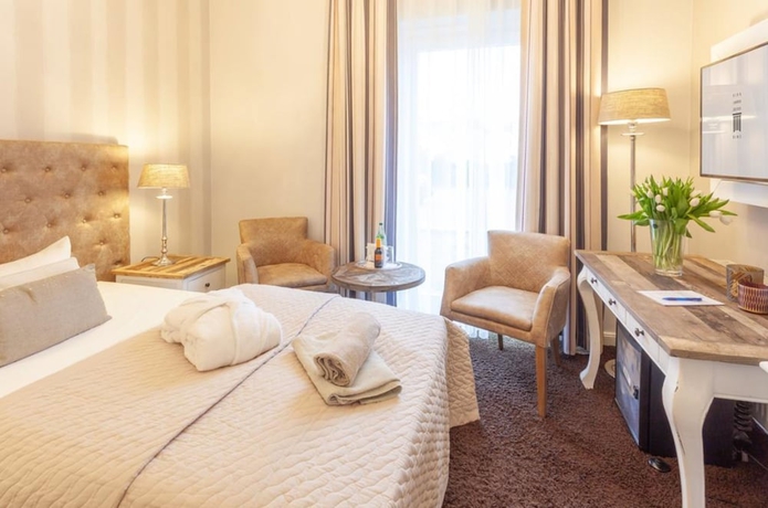 Imagen de la habitación del Hotel Vier Jahreszeiten Binz - Adults Only. Foto 11