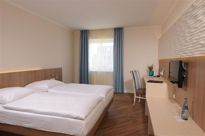 Imagen de la habitación del Hotel Vier Jahreszeiten Lübeck. Foto 8