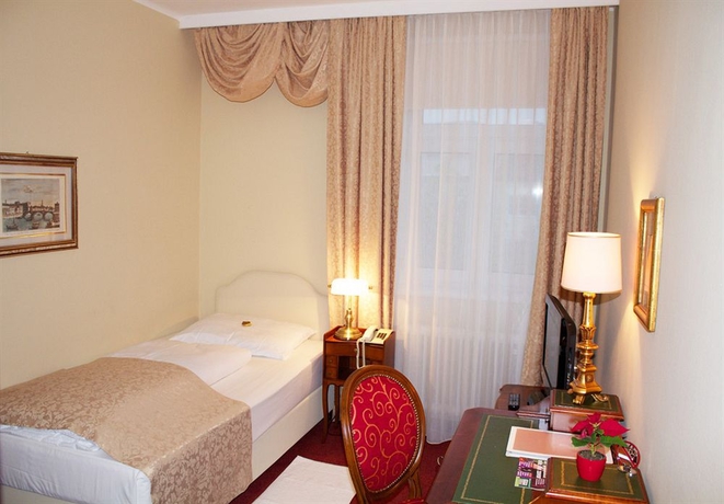 Imagen de la habitación del Hotel Vier Jahreszeiten, Salzburgo. Foto 4