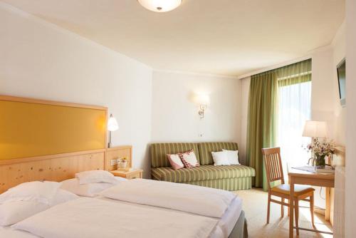 Imagen de la habitación del Hotel Vierbrunnenhof. Foto 7