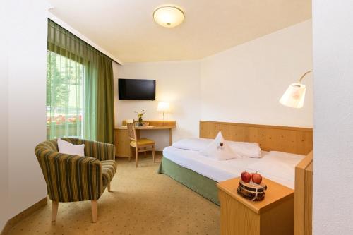 Imagen de la habitación del Hotel Vierbrunnenhof. Foto 8