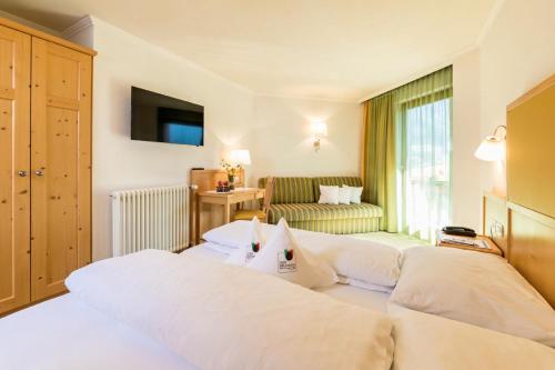 Imagen de la habitación del Hotel Vierbrunnenhof. Foto 9