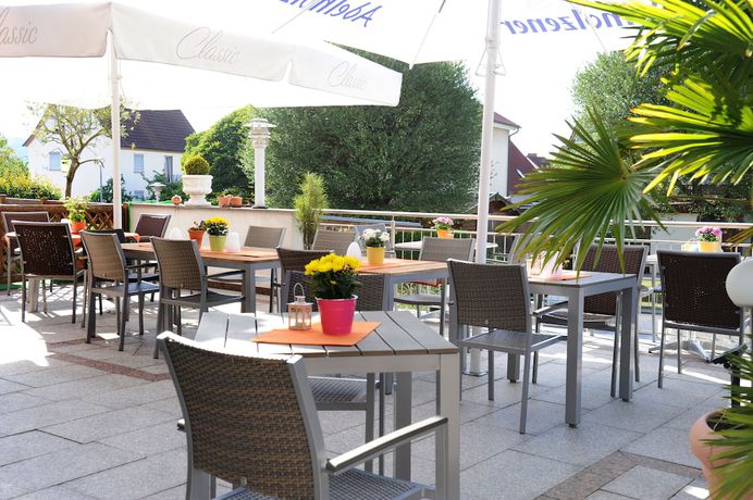Imagen del bar/restaurante del Hotel Vierjahreszeiten, Unteroberndorf. Foto 5