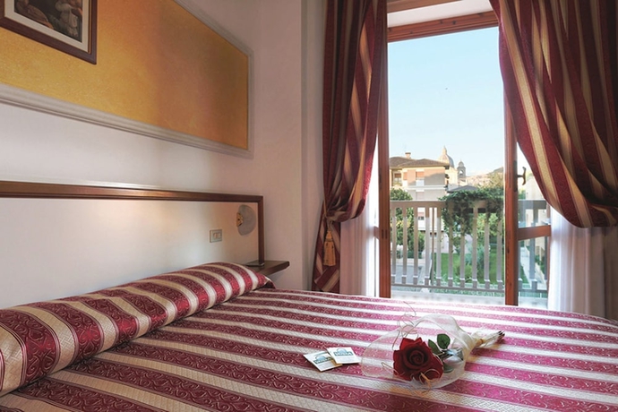Imagen de la habitación del Hotel Vignola. Foto 14