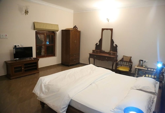 Imagen de la habitación del Hotel Vijaigarh kothi. Foto 9