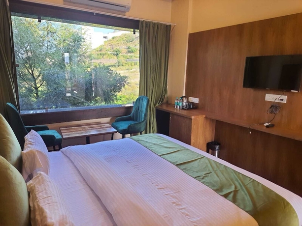 Imagen de la habitación del Hotel Vijay Garh Resort Udaipur. Foto 4
