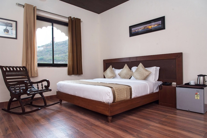 Imagen de la habitación del Hotel Vijay Garh Resort Udaipur. Foto 11