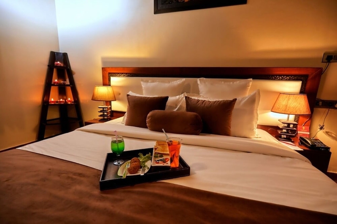 Imagen de la habitación del Hotel Vijay Garh Resort Udaipur. Foto 15