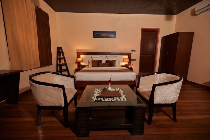 Imagen de la habitación del Hotel Vijay Garh Resort Udaipur. Foto 17