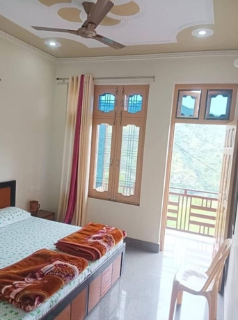 Imagen de la habitación del Hotel Vijay Residency Barkot. Foto 10