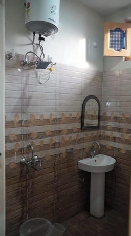 Imagen de la habitación del Hotel Vijay Residency Barkot. Foto 13