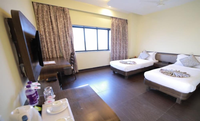 Imagen de la habitación del Hotel Vijaya Tej Clarks Inn. Foto 11