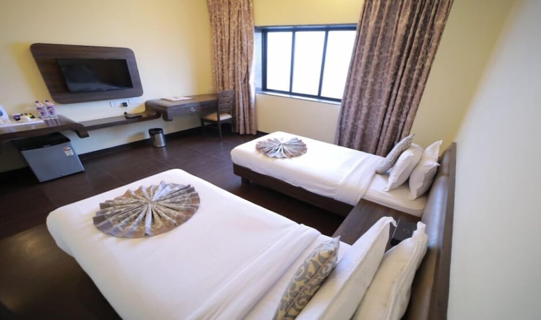 Imagen de la habitación del Hotel Vijaya Tej Clarks Inn. Foto 12