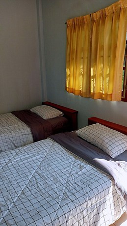 Imagen de la habitación del Hotel Vijitporn House. Foto 6