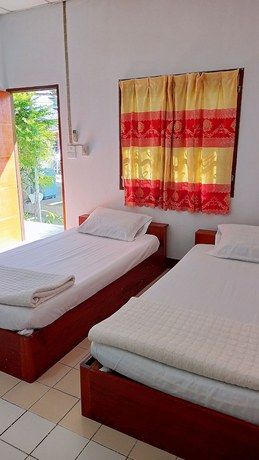 Imagen de la habitación del Hotel Vijitporn House. Foto 11