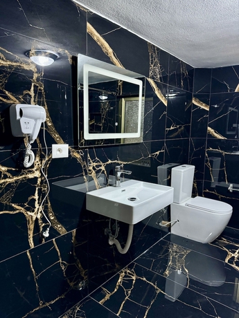 Imagen de la habitación del Hotel Vila Alizee. Foto 13