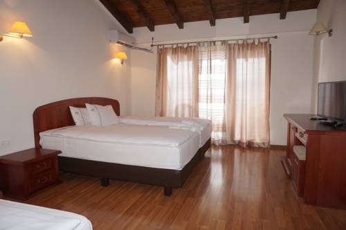 Imagen de la habitación del Hotel Vila Bisera. Foto 8