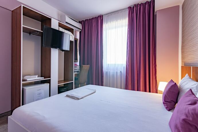 Imagen de la habitación del Hotel Vila Bordeaux. Foto 15