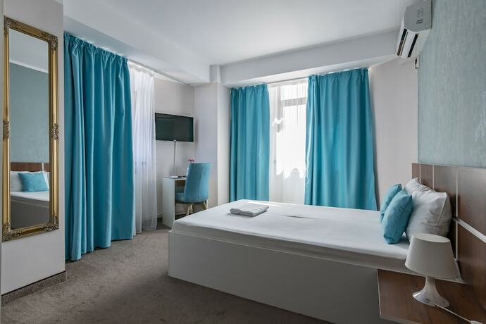 Imagen de la habitación del Hotel Vila Bordeaux. Foto 17