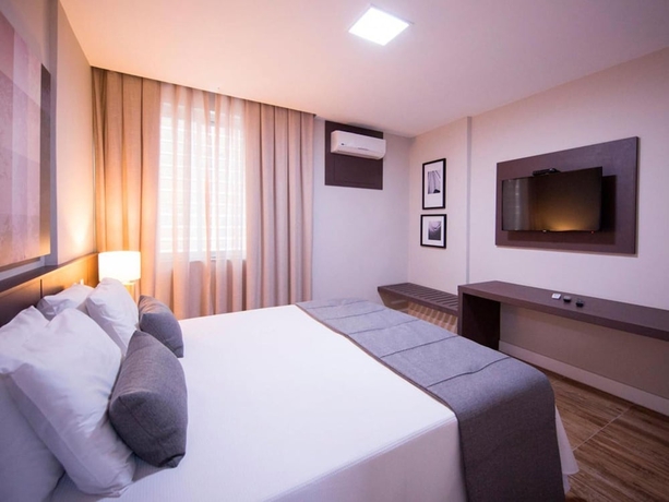 Imagen de la habitación del Hotel Vila Business. Foto 12