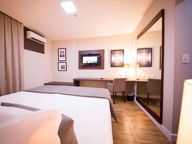 Imagen de la habitación del Hotel Vila Business. Foto 15