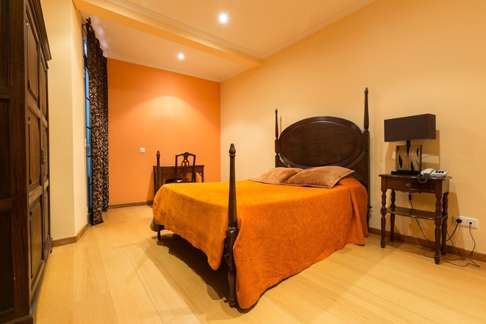 Imagen de la habitación del Hotel Vila Camacho Guest House. Foto 14