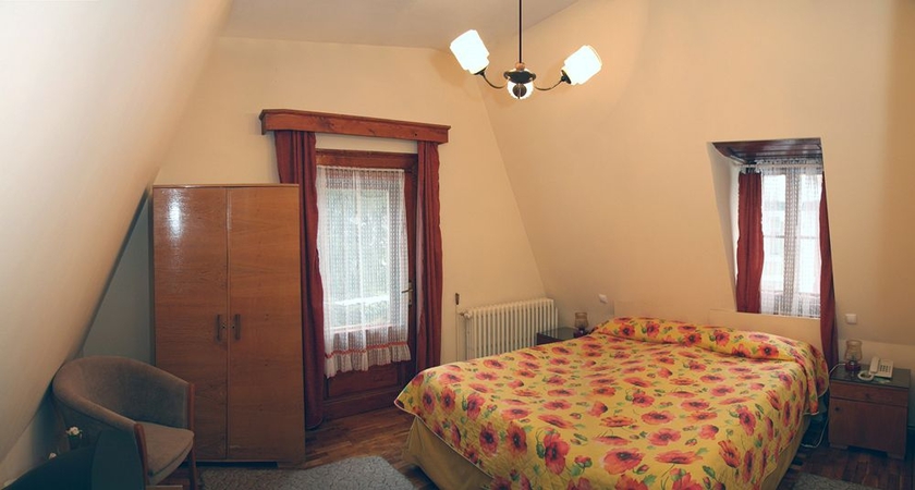 Imagen de la habitación del Hotel Vila Camelia Sinaia. Foto 2