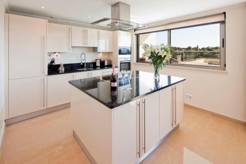 Imagen de la habitación del Hotel Vila Castelo Parque. Foto 16