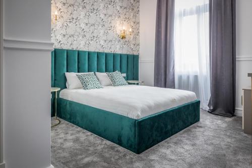 Imagen de la habitación del Hotel Vila Central Boutique Satu Mare. Foto 12