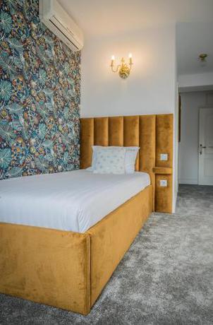 Imagen de la habitación del Hotel Vila Central Boutique Satu Mare. Foto 16