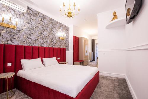 Imagen de la habitación del Hotel Vila Central Boutique Satu Mare. Foto 20