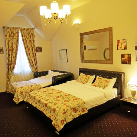 Imagen de la habitación del Hotel Vila Elat. Foto 9
