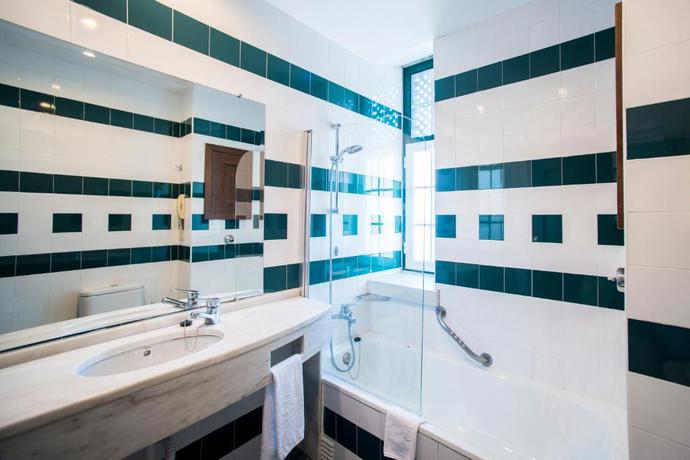 Imagen de la habitación del Hotel Vila Gale Ericeira. Foto 4