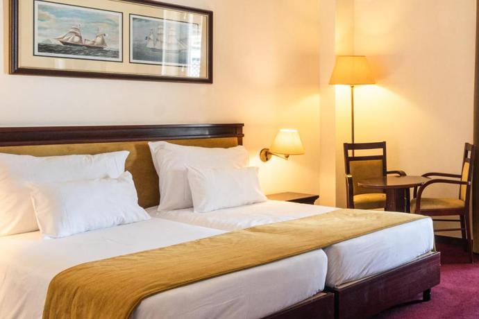 Imagen de la habitación del Hotel Vila Gale Ericeira. Foto 8