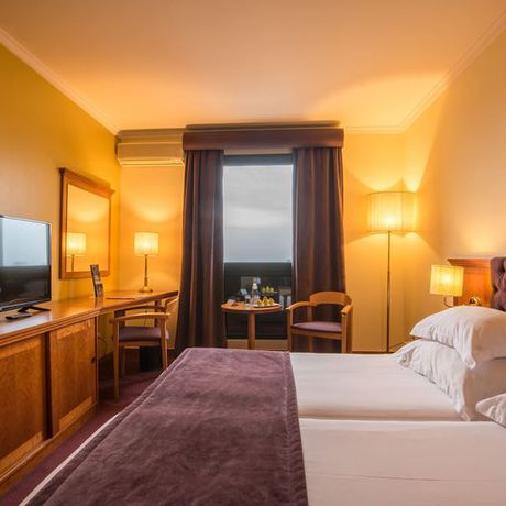 Imagen de la habitación del Hotel Vila Galé Porto. Foto 7