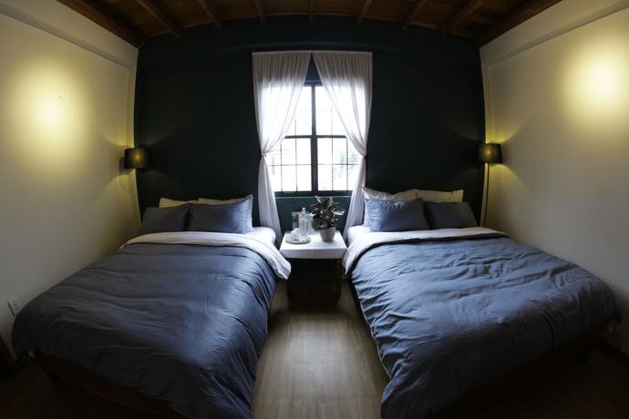 Imagen de la habitación del Hotel Vi-la Homestay Caf&eacute;. Foto 7