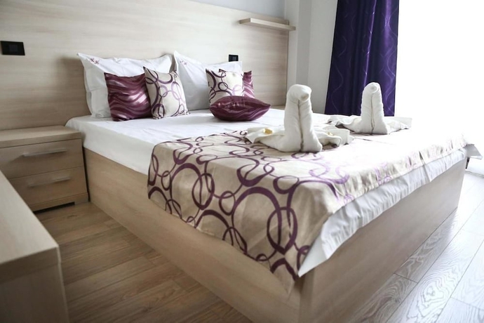 Imagen de la habitación del Hotel Vila Kharisma. Foto 6