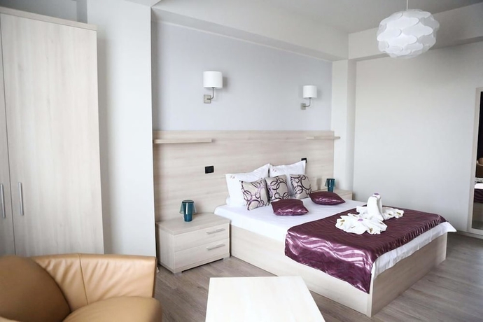 Imagen de la habitación del Hotel Vila Kharisma. Foto 9